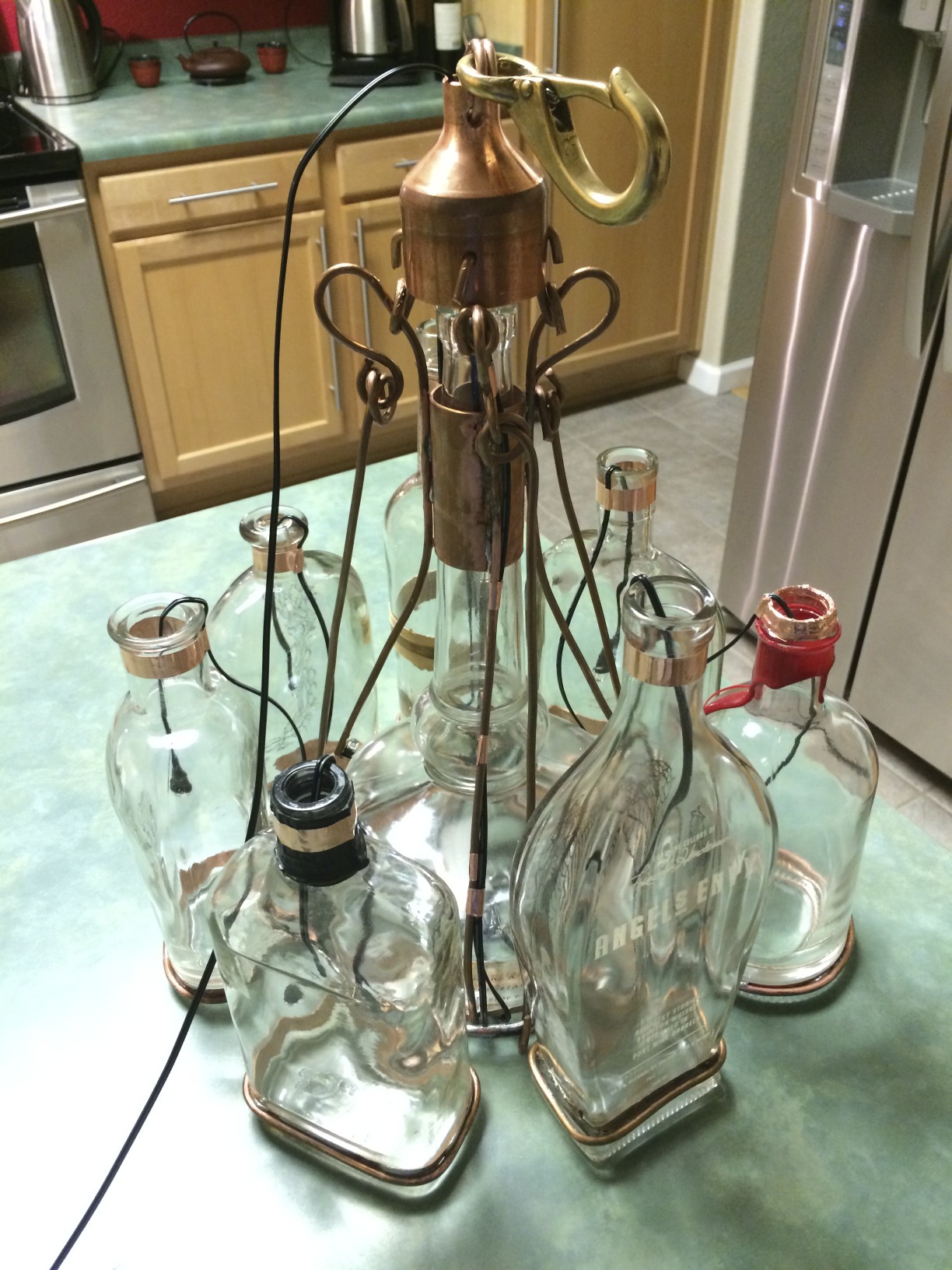 LEDs Strung Through Bourbon Bottles