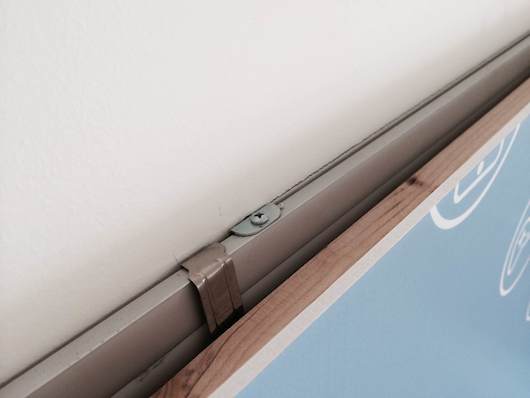 Metal PC Slot Cover Repurposed as a Hook in Action