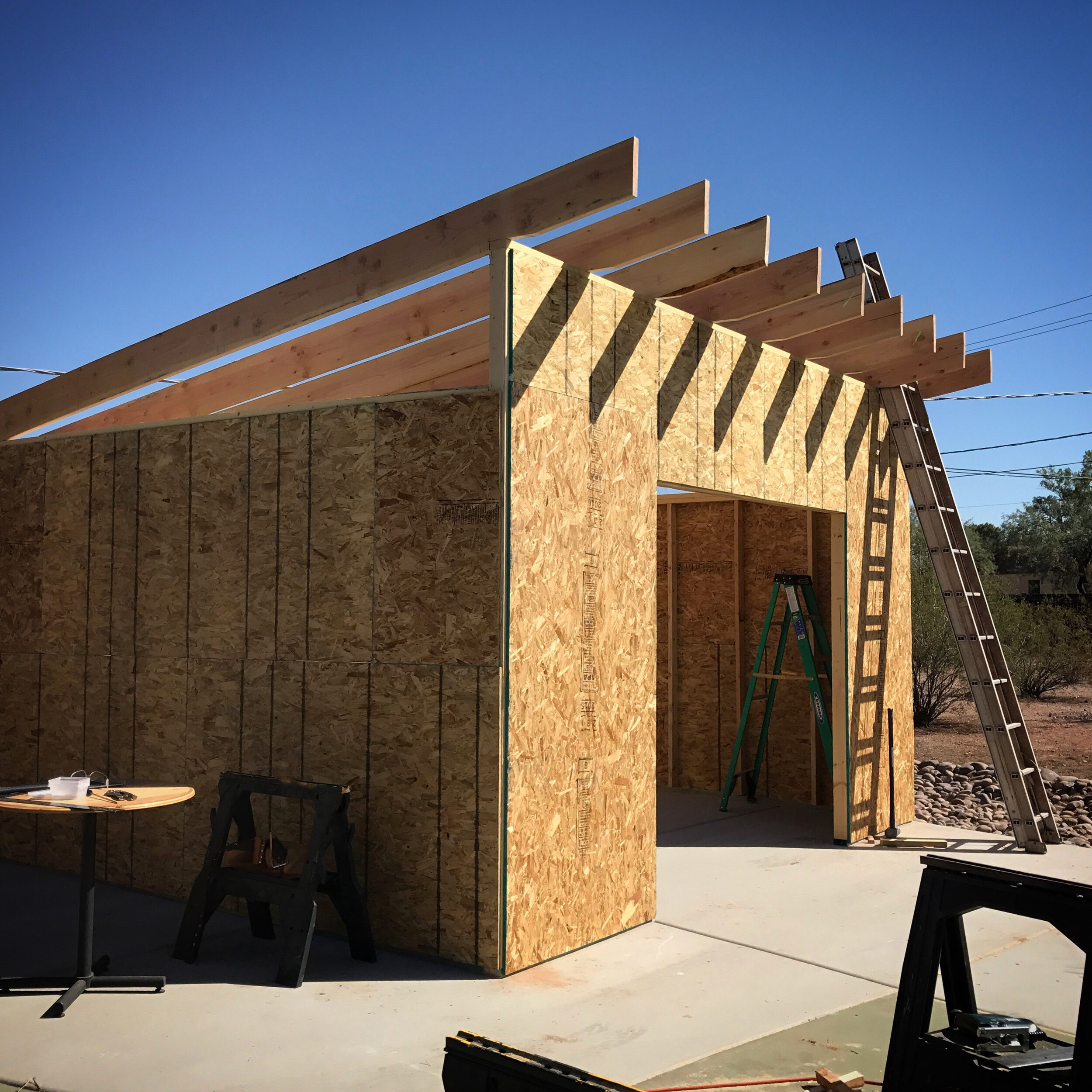 2x10 rafters in place and held there with nails and hurricane ties