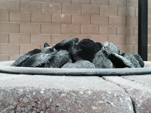 Side view: Lava feather rock in fire pit