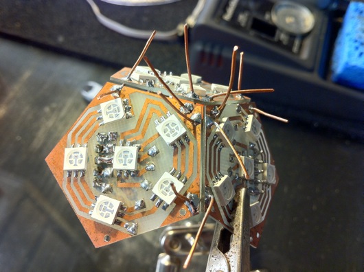 Panels being stitched together with copper wire