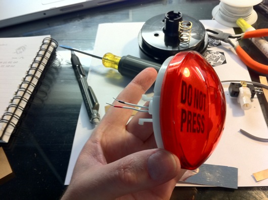 Reassembled dome part of button