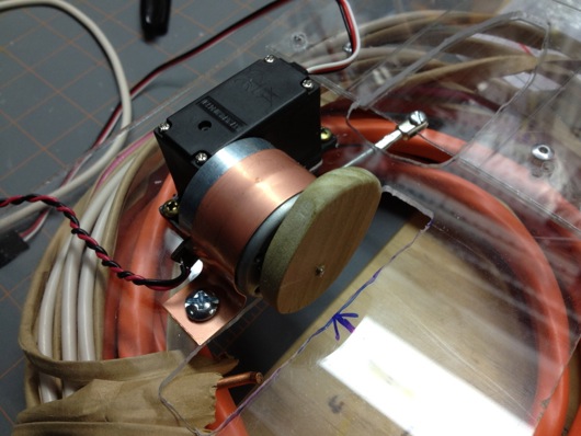 Wood cam that vibrates jingle bells